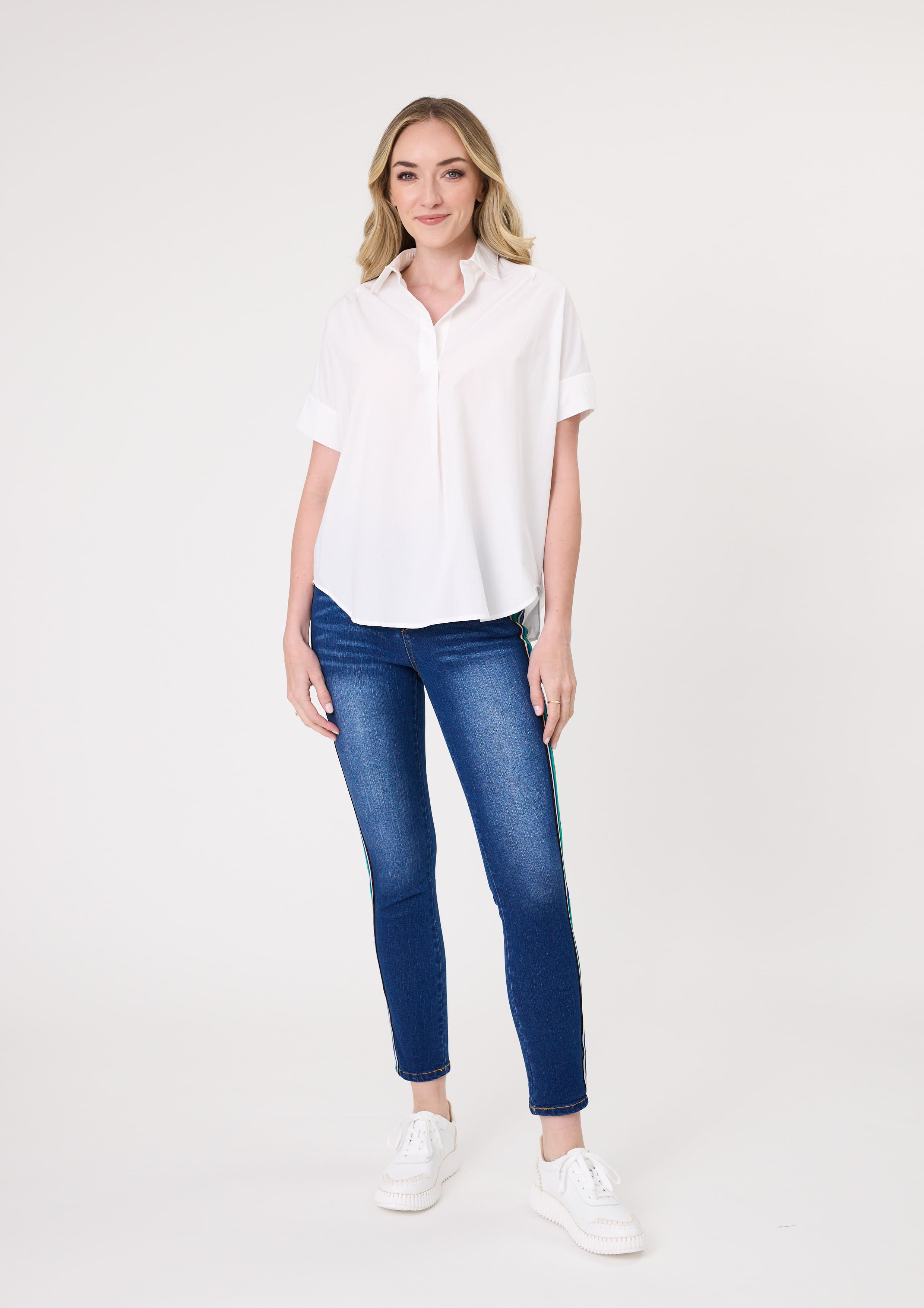 Dora Top in crisp white with a classic collar, made from 100% cotton for breathable comfort.