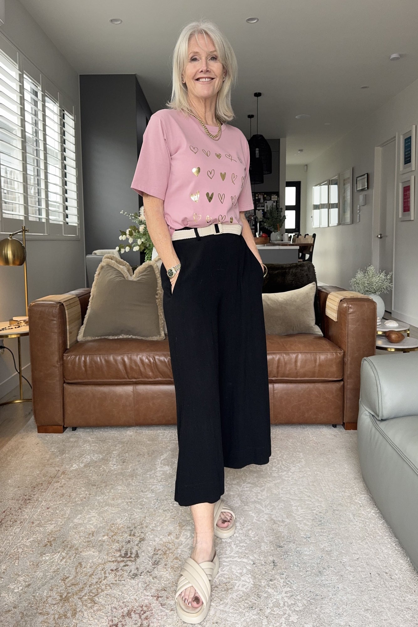 Carina Tee in pink with gold foil heart detailing, featuring a classic round neckline and short sleeves.