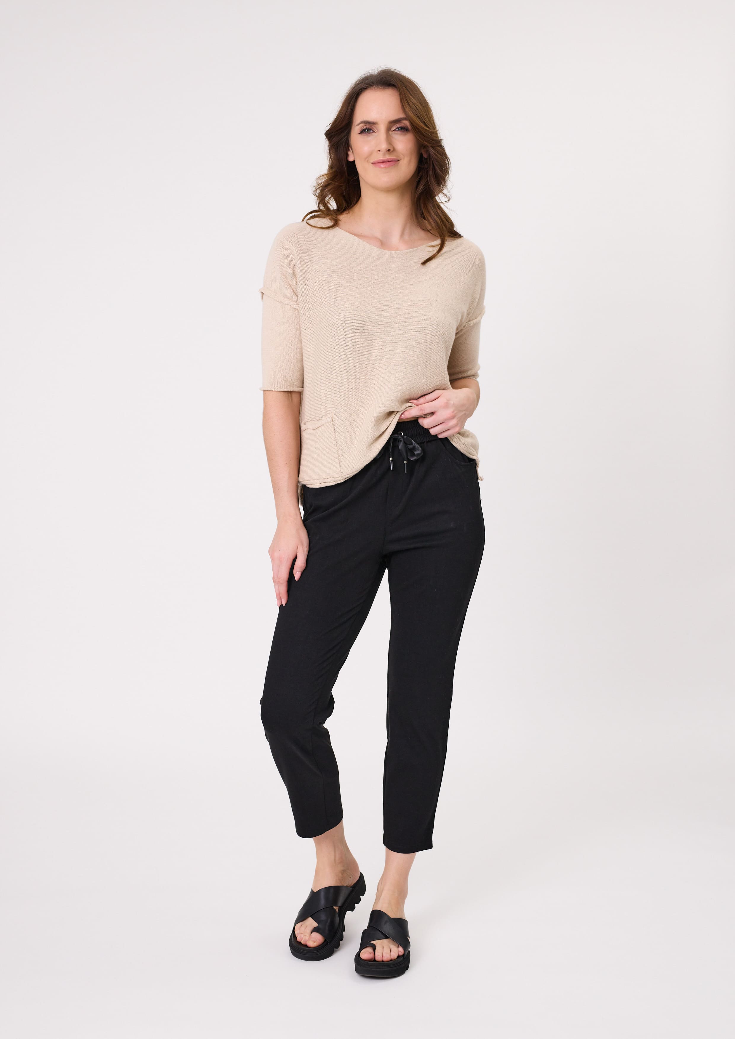 Gemma Pant in black with a slim, ankle-length cut, elasticated waistband with satin ties, and side and back pockets, made from a soft cotton-viscose blend.