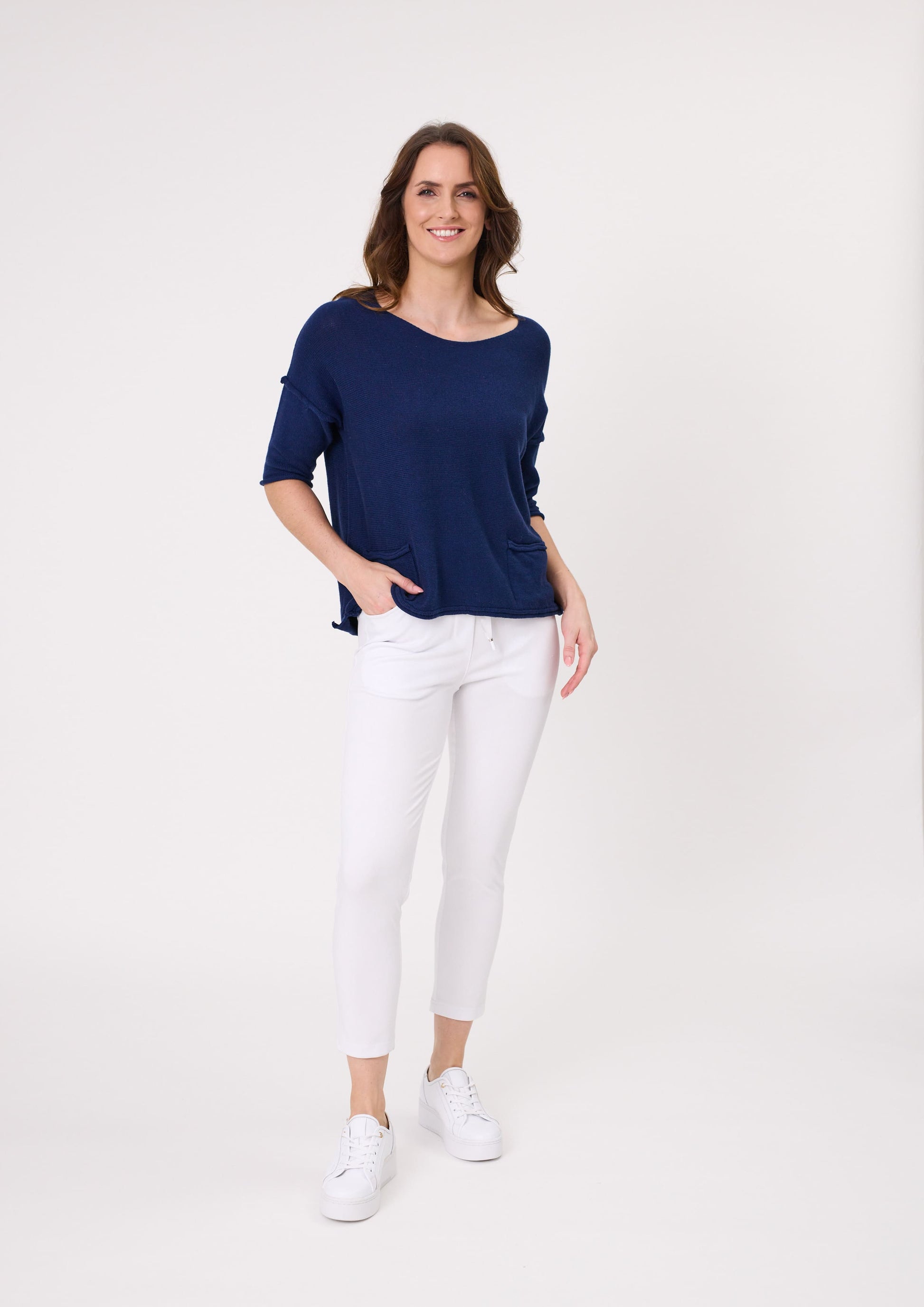 Gemma Pant in white with a slim, ankle-length cut, elasticated waistband with satin ties, and side and back pockets, made from a soft cotton-viscose blend.