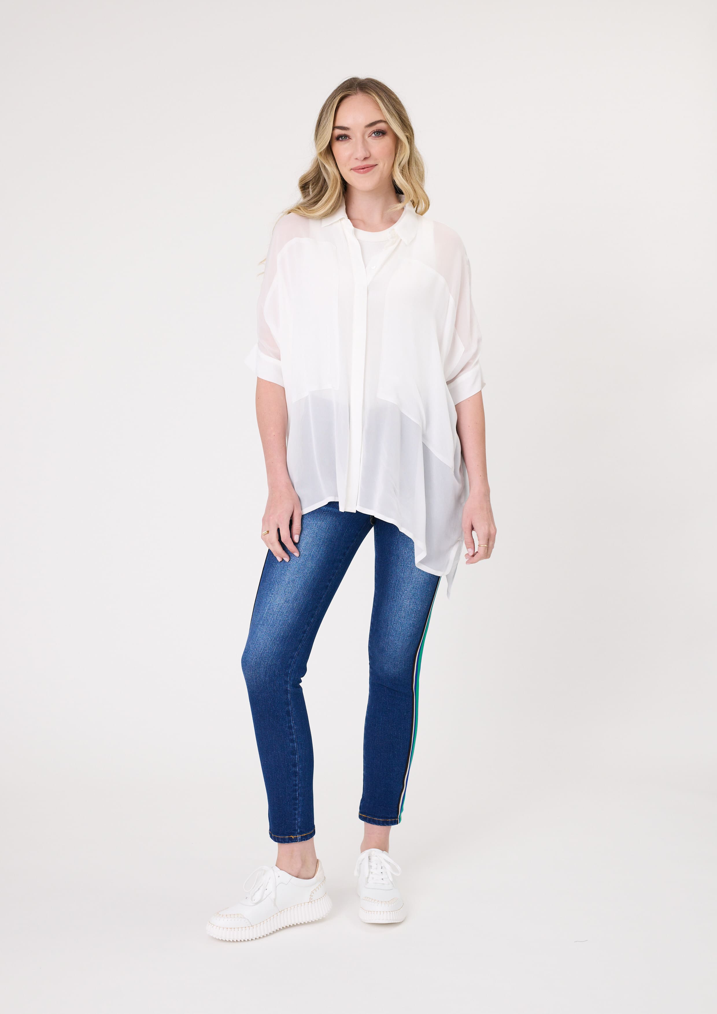 Sheer short-sleeve blouse in white with front buttons and a high-low hemline.