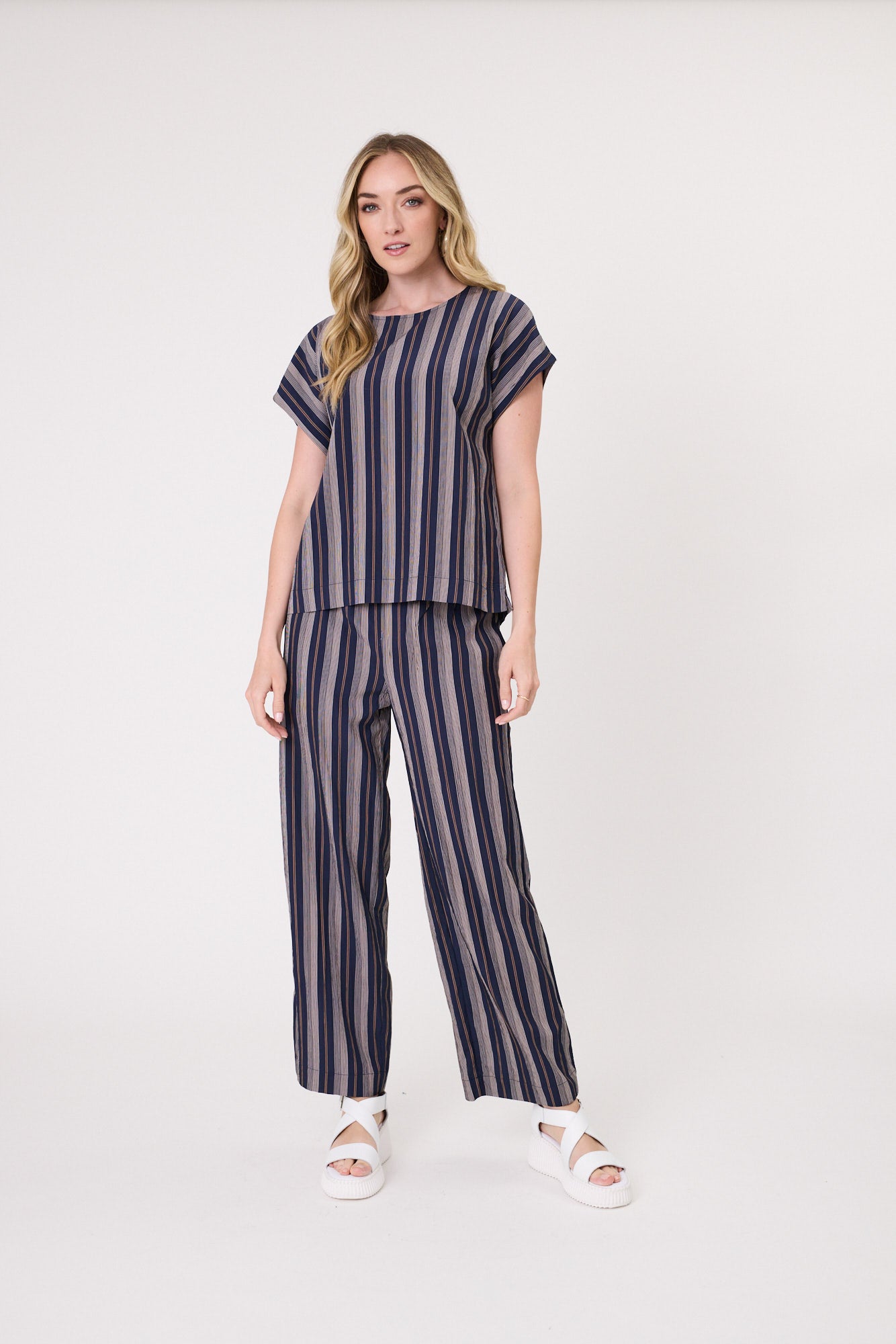 Martina Pant in navy stripe with a loose fit, side pockets, and a breezy, relaxed silhouette for casual comfort.