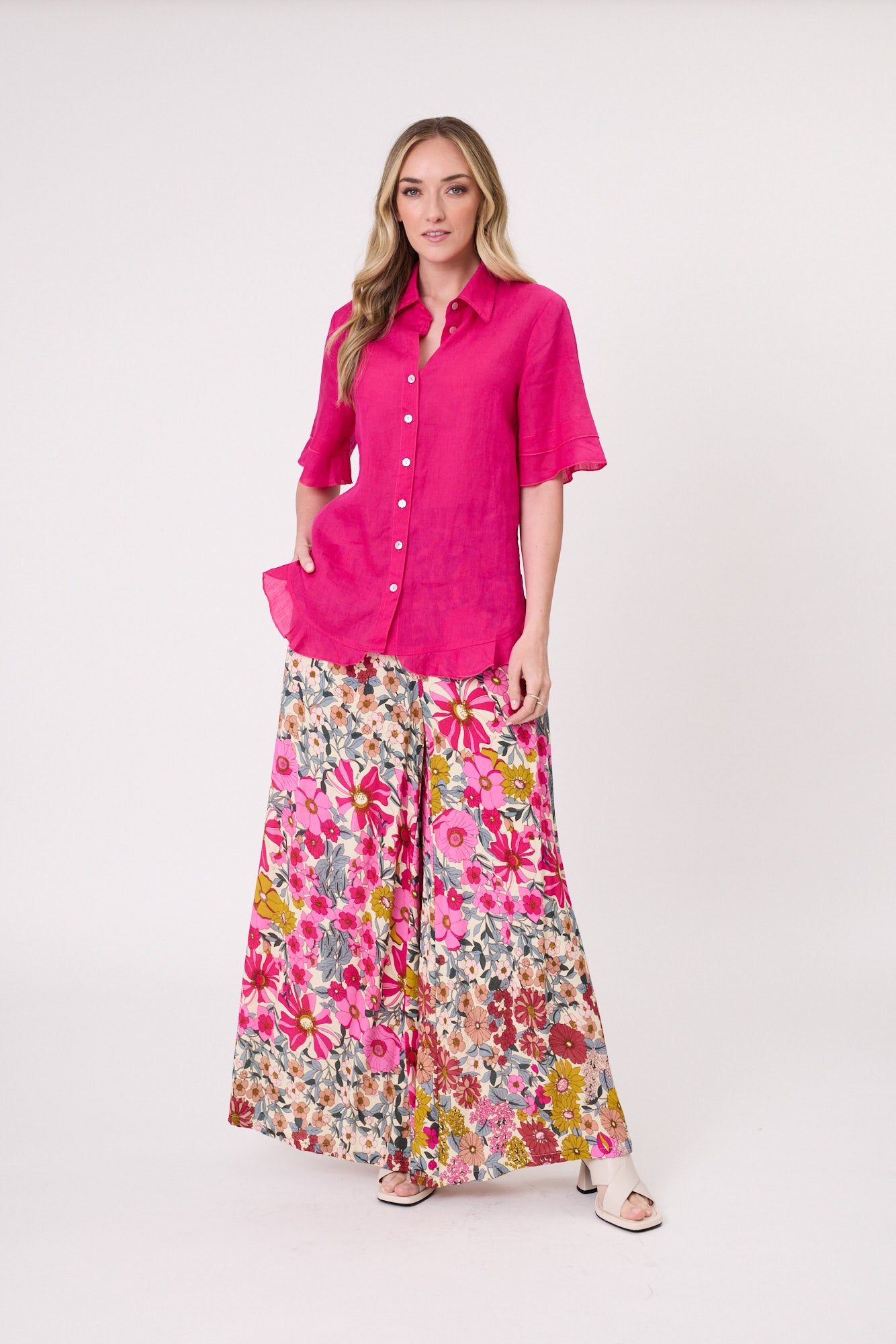 Massima Pant in garden-inspired floral print with a flowy wide-leg silhouette and side pockets for comfort and ease.