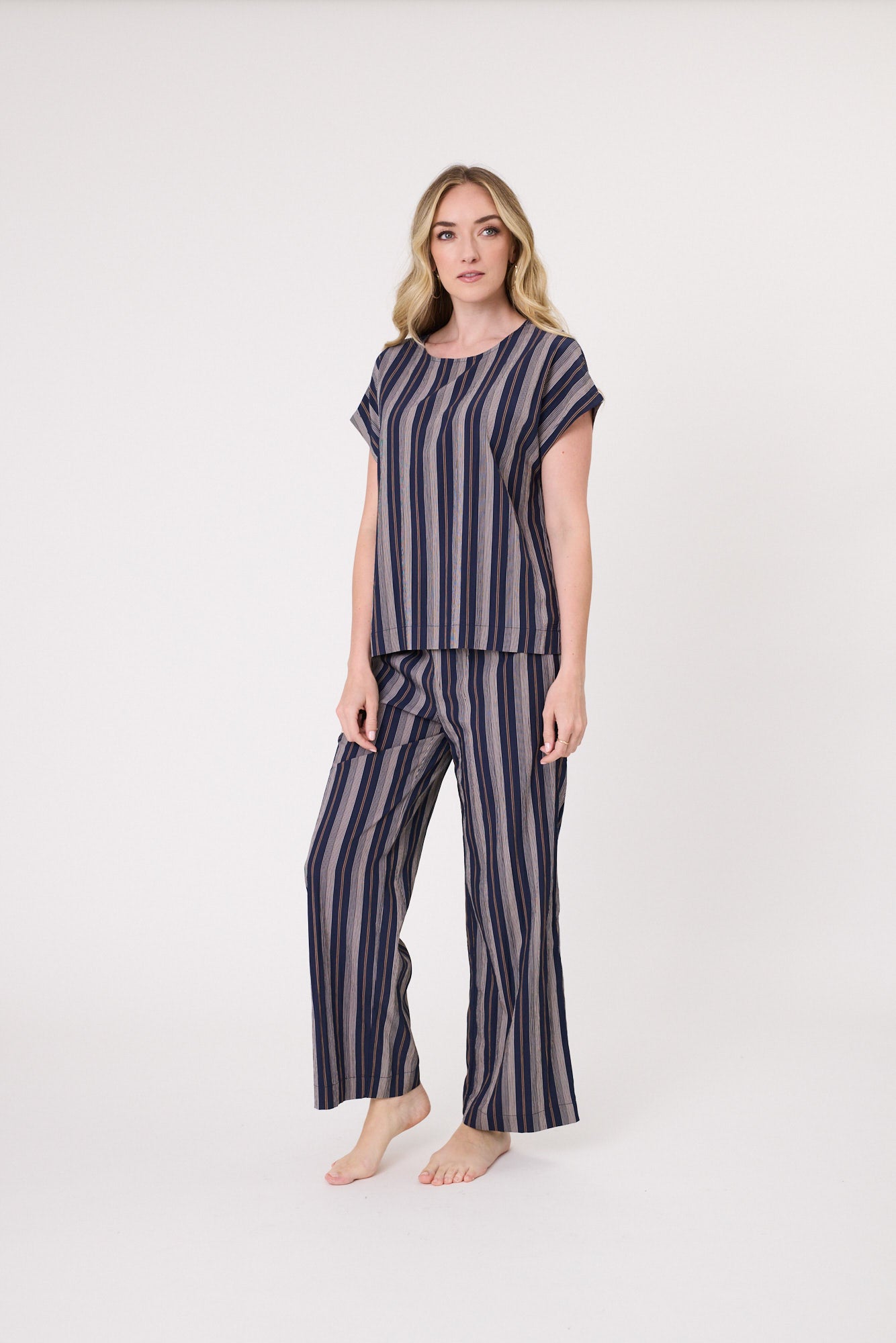 Melani Top in navy stripe with short sleeves and a relaxed, easy-to-wear silhouette for everyday comfort.