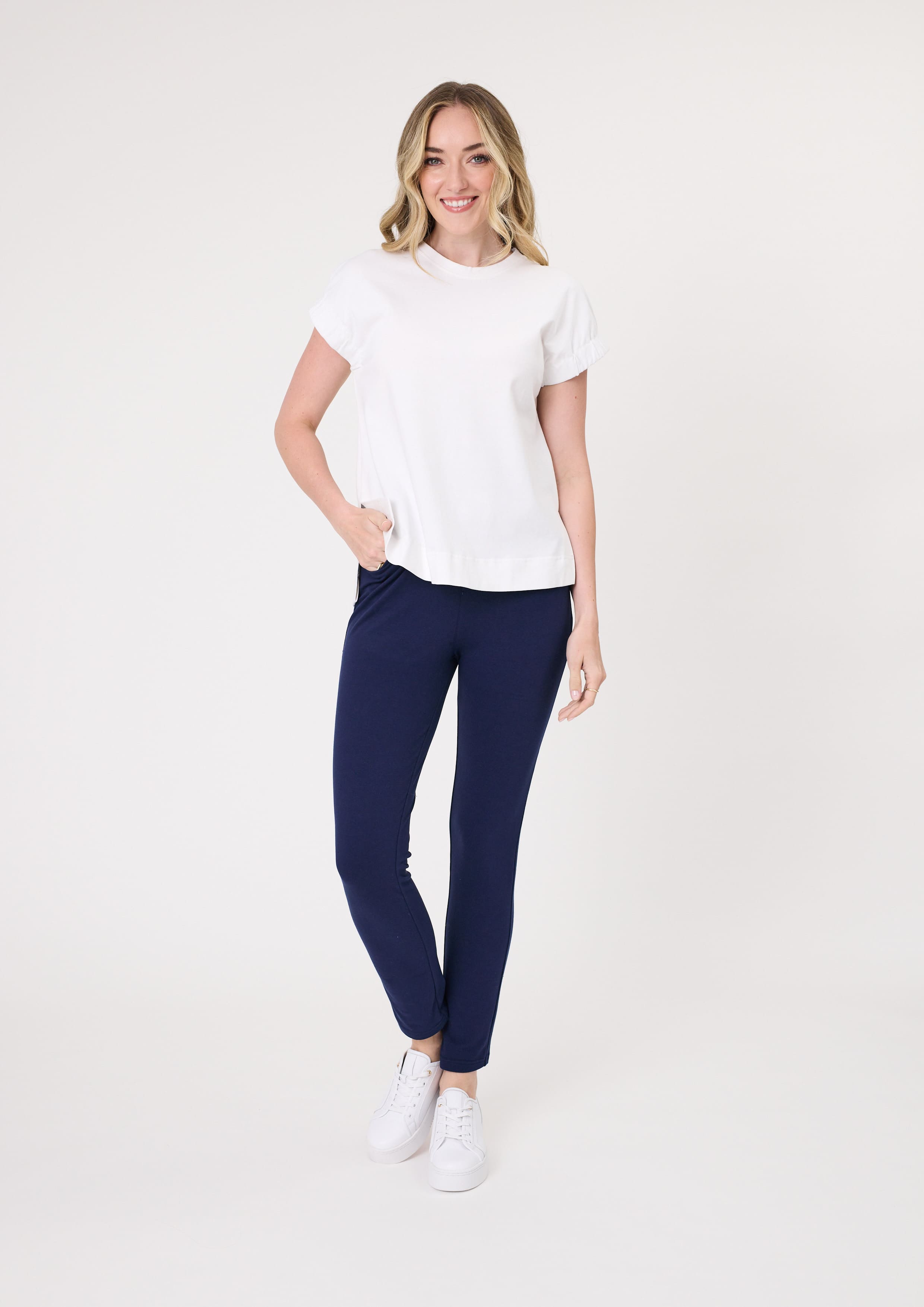 Michaela Tee in white with a round neckline and softly cinched short sleeves, made from 100% cotton.