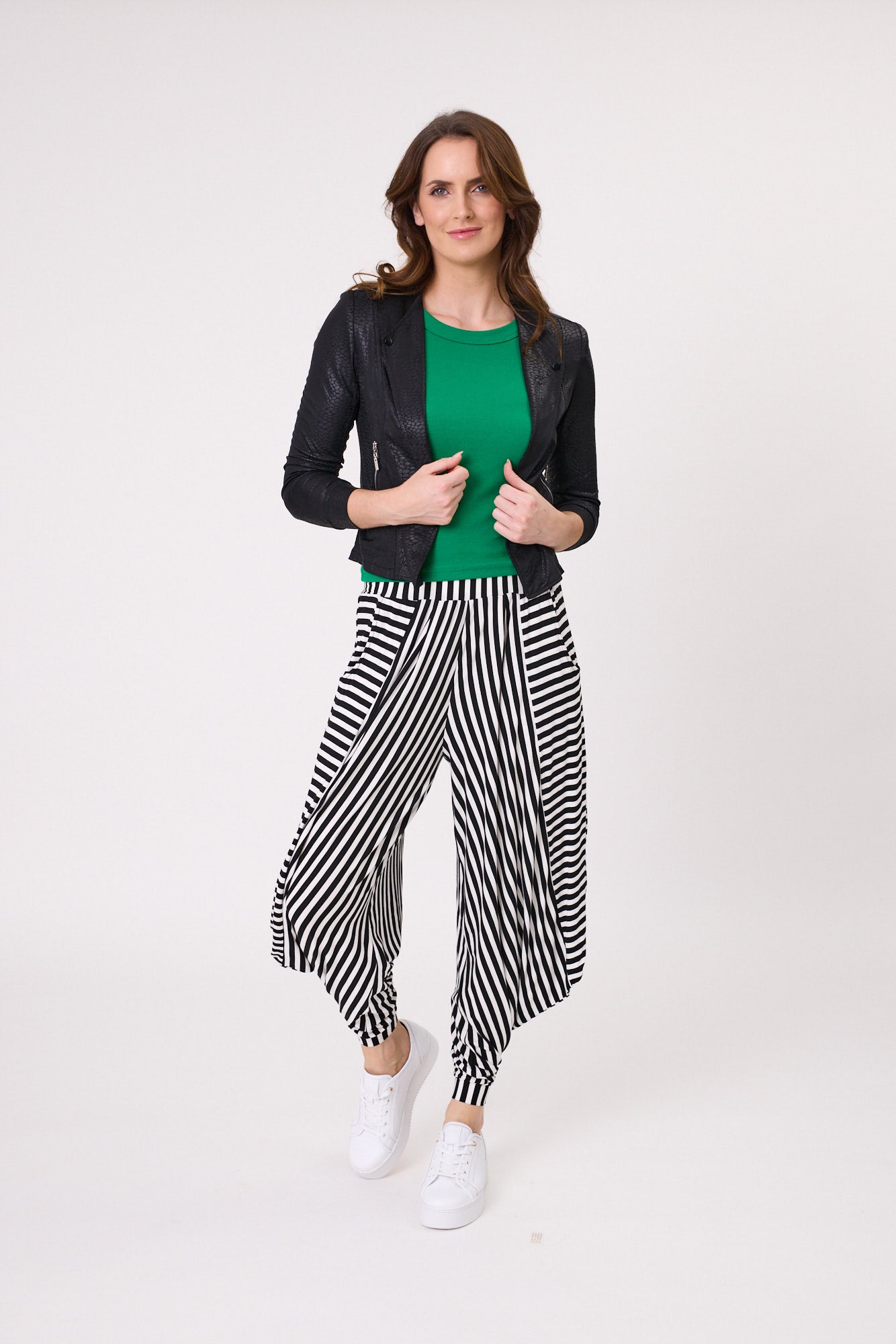 Mika Jacket in black snakeskin print with silver zip and stud detailing, featuring a cropped, slim fit and functional pockets in a stretchy fabric.
