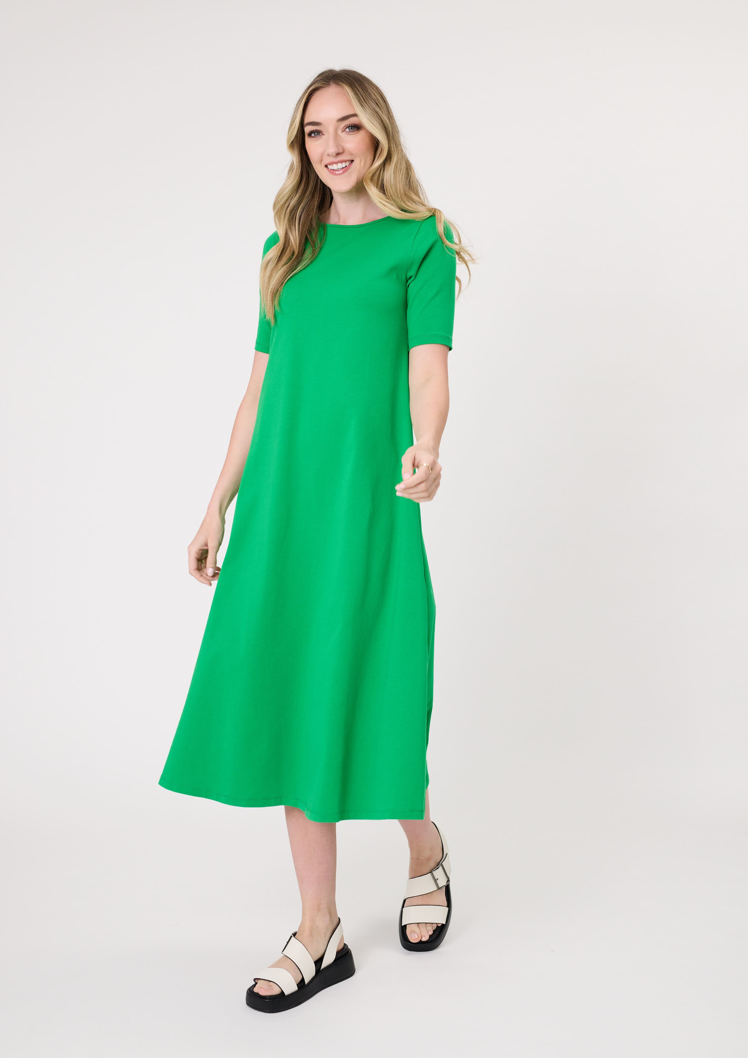 Sole Dress in green with a midi-length silhouette and short sleeves, made from 100% cotton for breathable, all-day comfort.